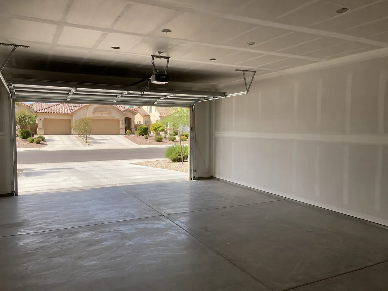 Finished drywall in a two-car garage in a Las Vegas valley home